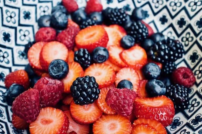 ''bowl of blueberries and strawberries, kidney-friendly fruits low in potassium